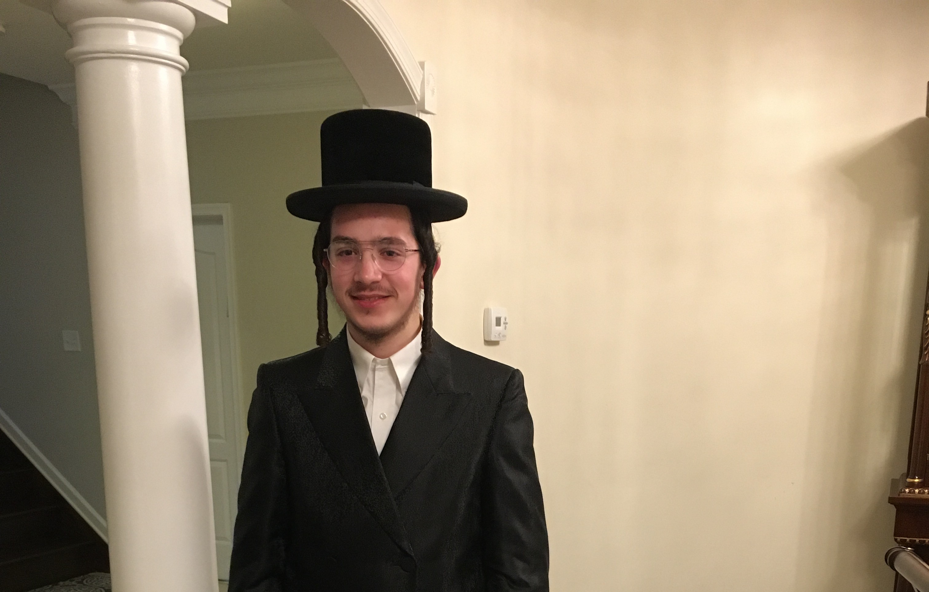 CEO Sruly Weiss in formal attire